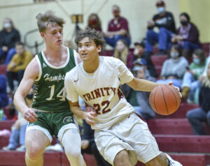 Trinity boys' basketball team trying to use patience, fall to Hampshire 41-38